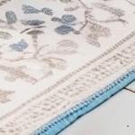 gray cushion/brown wicker