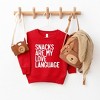 The Juniper Shop Snacks Are My Love Language Toddler Graphic Sweatshirt - 2 of 2