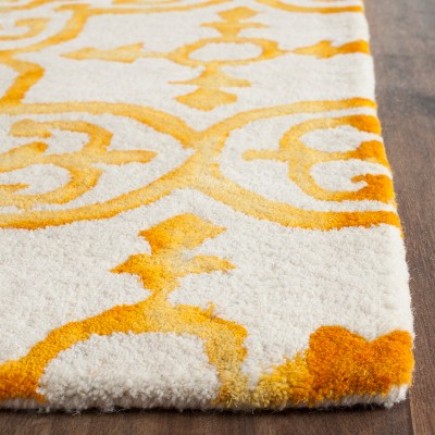 Ivory and Gold Hand-Tufted Wool Round Rug