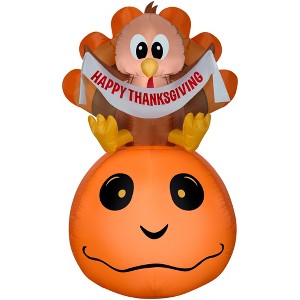 Gemmy Airblown Inflatable Pumpkin and Turkey with Happy Thanksgiving Banner, 4.5 ft Tall, Orange - 1 of 4