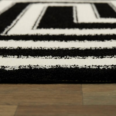 Black and White Geometric Stain-Resistant Synthetic Rug 5'3" x 7'