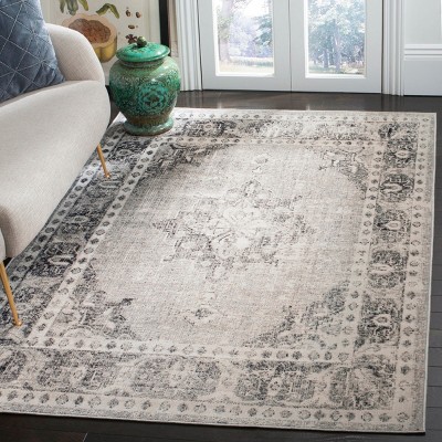 Grey and Ivory Medallion Synthetic 4' x 6' Area Rug