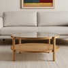 HomeRoots 34" Clear and Natural Glass and Solid Wood Round Coffee Table With Shelf - 2 of 4