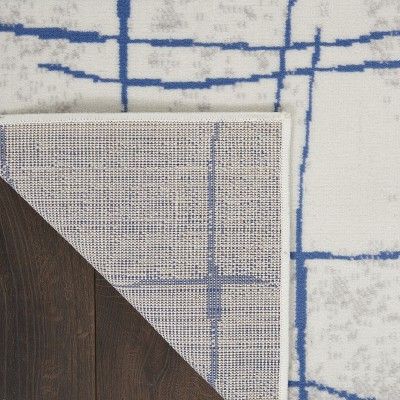 Ivory Abstract Linear 6' x 9' Machine-Made Synthetic Area Rug