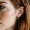 Ross-Simons Italian 10kt Yellow Gold Oval Domed Hoop Earrings - 2 of 3