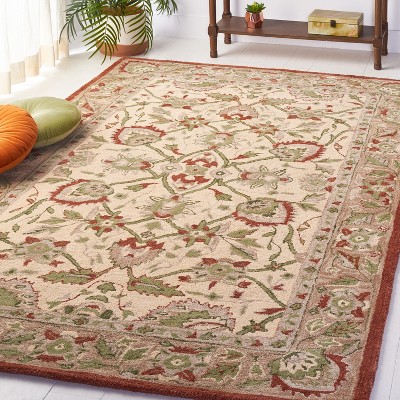Antiquity Rust and Ivory Wool 3' x 5' Hand-Tufted Area Rug