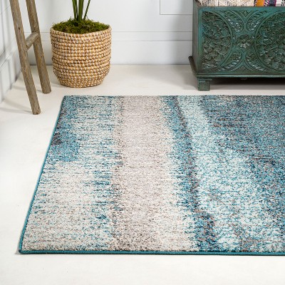 Cream and Turquoise Abstract Synthetic Area Rug
