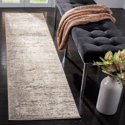 Ivory Abstract Synthetic 28" Easy-Care Hand-Knotted Rug