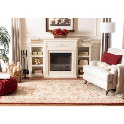 Handmade Beige and Rust Floral Wool Area Rug, 5' x 8'