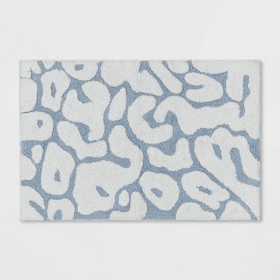 blue and white bath mat