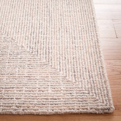 Ivory Abstract Handmade Round Wool Tufted Rug, 6' x 9'