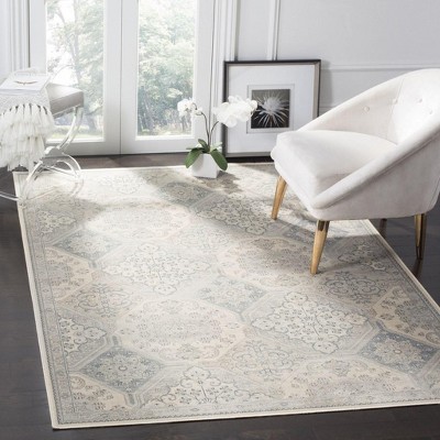 Handmade Cream and Blue Round Viscose Area Rug