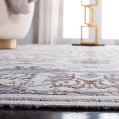 Ivory and Gray Abstract Synthetic Area Rug, 8' x 10'
