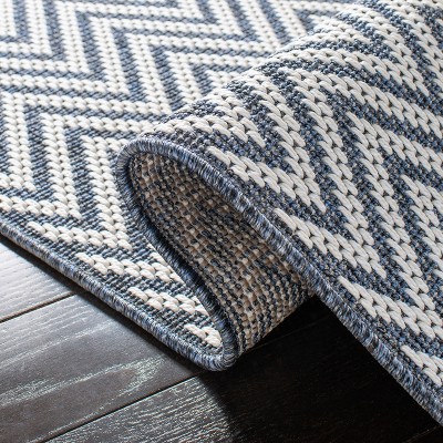 Blue and Creme 4' x 6' Geometric Flat Woven Rug