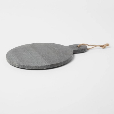 Natural shaped cutting board with handle and a hole for hanging