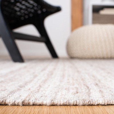 Handmade Ivory and Brown Wool Flat Woven 8' x 10' Area Rug
