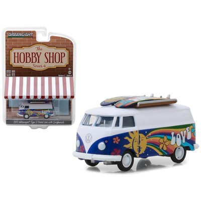 toy vw bus with surfboards