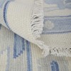 Ivory and Blue Wool Floral Hand Knotted Area Rug With Fringe - 4 of 4