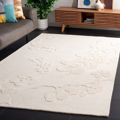 Ivory Hand Tufted Wool 4' x 6' Area Rug