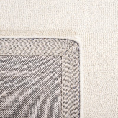 Ivory and Green Hand-Tufted Wool 6' x 9' Rectangular Rug