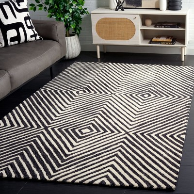 Ebony Black and Ivory Wool Handmade Tufted 5'x8' Area Rug