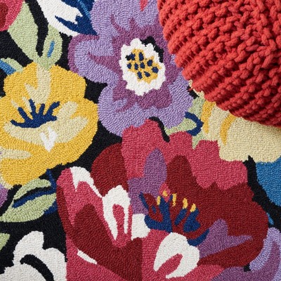 Handmade Chelsea Floral Black Wool Oval Rug - 4' x 6'