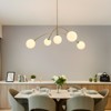 PAKOKULA Modern 5-Light Gold Sputnik Chandelier with White Globe Glass Shade for Living Room - 2 of 4