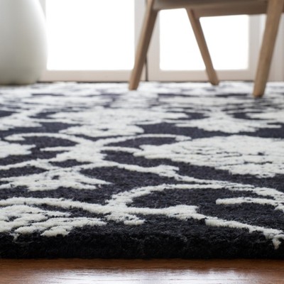 Black and Ivory 6' x 9' Hand-Tufted Wool Area Rug
