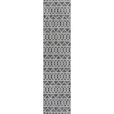 Aylan Black/Ivory Geometric High-Low Pile Synthetic Indoor/Outdoor Rug