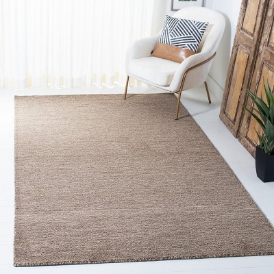 Hand-Knotted Serene Blue Wool Rectangular Area Rug - 5' x 8'
