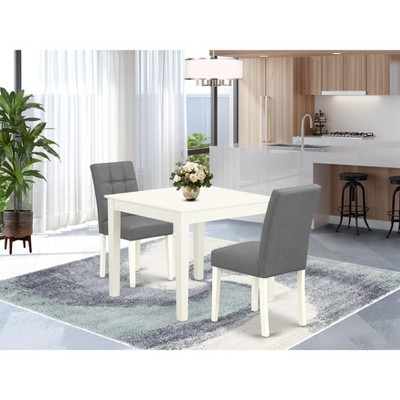 East West Furniture 3 Piece Dinner Table Set consists A Dining Kitchen Table and 2 Platinum Gray Faux Leather Wood Chairs with Stylish Back
