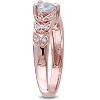 EVERLY JEWELRY | Rose Plated Sterling Silver 0.05 CT TW Diamond And 1/3 CT TGW Aquamarine Heart Ring - 2 of 4