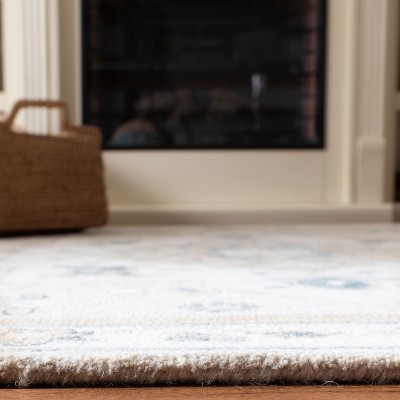 Handmade Beige and Ivory Wool Tufted Area Rug