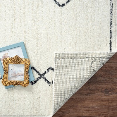 Cream Geometric Synthetic 8' x 10' Area Rug