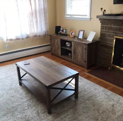user image by Deanna, Sophie Rustic Industrial X Frame Coffee Table - Saracina Home