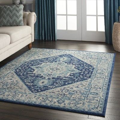 Ivory and Navy Synthetic 5' x 7' Rectangular Area Rug