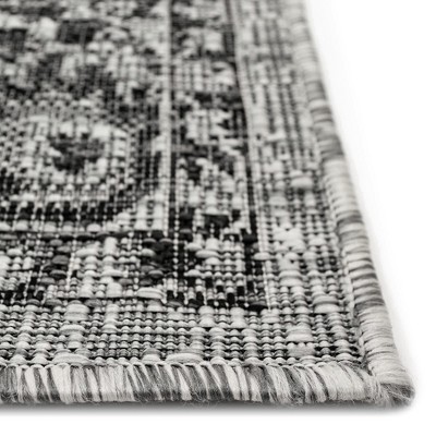 Carmel 24" Black Synthetic Flat Woven Floral Rug