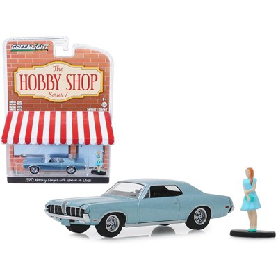 1970 Mercury Cougar Light Blue Met. with Woman in Dress Figurine "The Hobby Shop" 1/64 Diecast Model Car by Greenlight