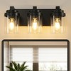 DAKAFUL Bathroom Vanity Light, Vanity Fixtures with Clear Glass Shades,Modern Matte Black Wall Sconce Over Mirror,for Bedroom/Living Room - 2 of 4