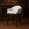 HomeRoots 40" White and Black Fabric and Solid Wood Bar Height Swivel Bar Chair - 2 of 4