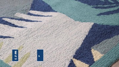 Hand-Tufted Round Blue Palm Leaf Synthetic Rug 2' x 3'