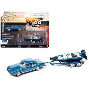 1980 Chevrolet Monte Carlo Bright Blue Met. w/Blue Interior w/Bass Boat & Trailer 1/64 Diecast Model Car by Johnny Lightning - 1 of 3