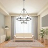 Sunset Lighting Messier 7 Light Chandelier, Clear Seeded Glass Globe, Dimmable, Antique Gunmetal Finish - 4 of 4
