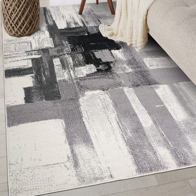 Elegant Abstract Black Synthetic 8' x 10' Area Rug