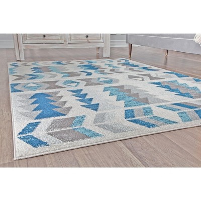 Mixed Berry and Blue Geometric Synthetic 8' x 10' Area Rug