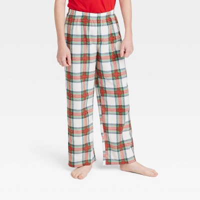 Kids' Holiday Tartan Plaid Fleece Matching Family Pajama Pants - Wondershop™ Cream