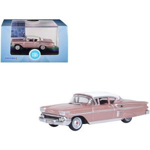 1958 Chevrolet Impala Sport Cay Coral Pink Metallic with White Top 1/87 (HO) Scale Diecast Model Car by Oxford Diecast - 1 of 4