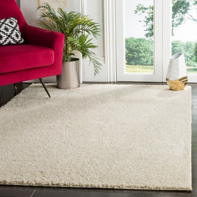Cream 8' x 10' Tufted Shag Area Rug