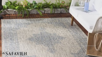 Teal and Ivory Rectangular Synthetic Indoor/Outdoor Rug