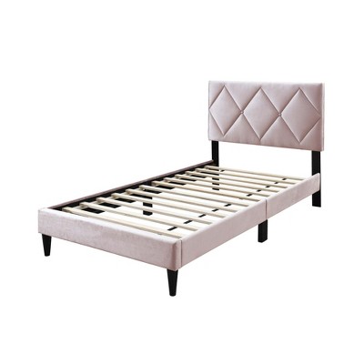 Offset angle view of bed showing headboard and slats